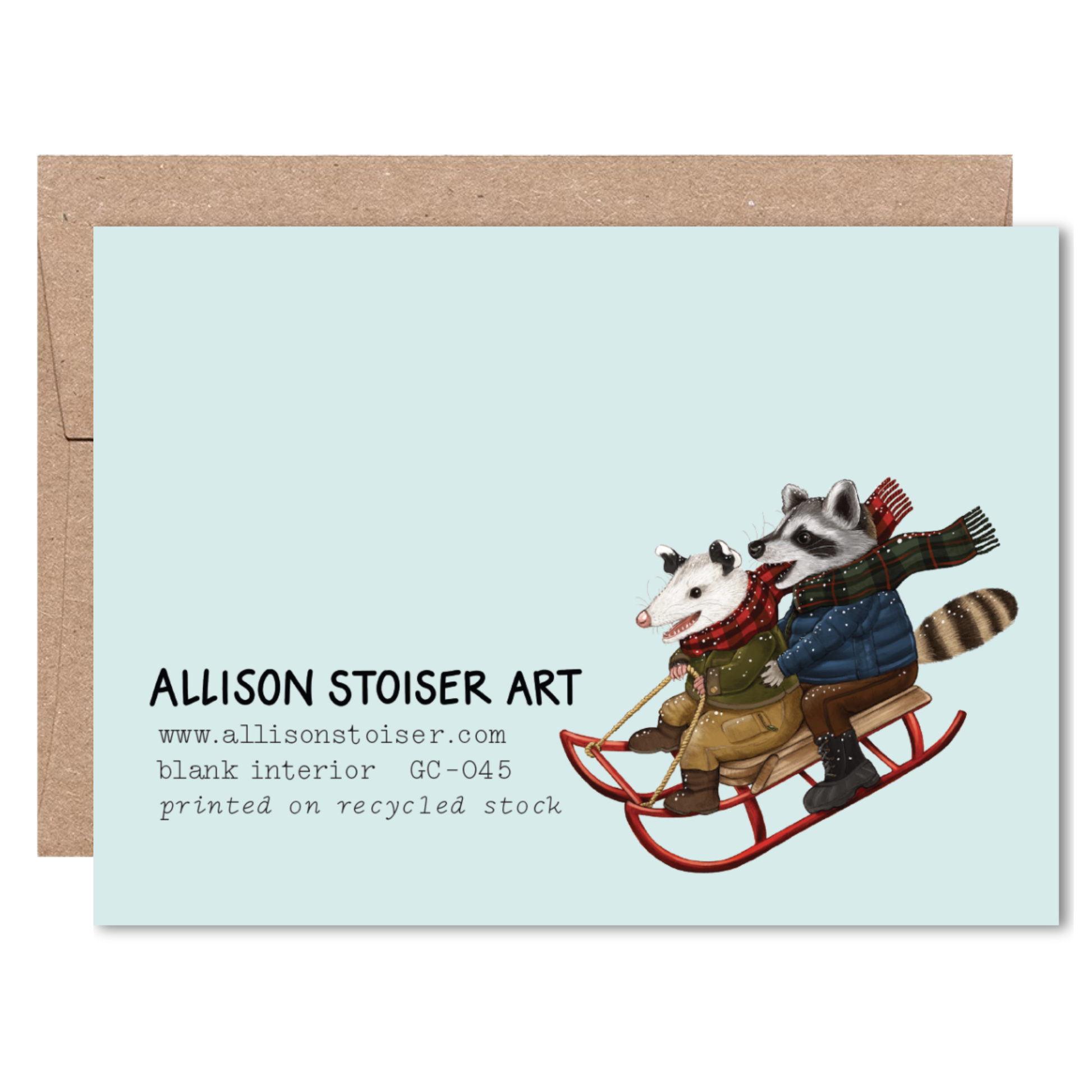 Back of card, with raccoon and opossum on a sled and Allison Stoiser Art branding