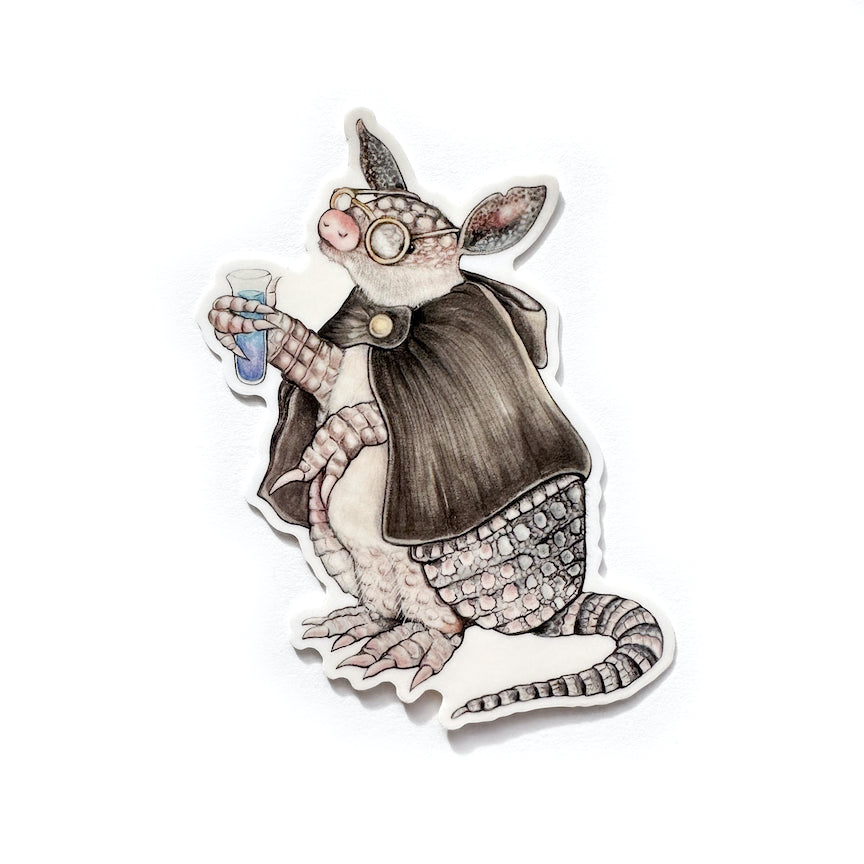 A sticker featuring an illustration of an armadillo working as an alchemist
