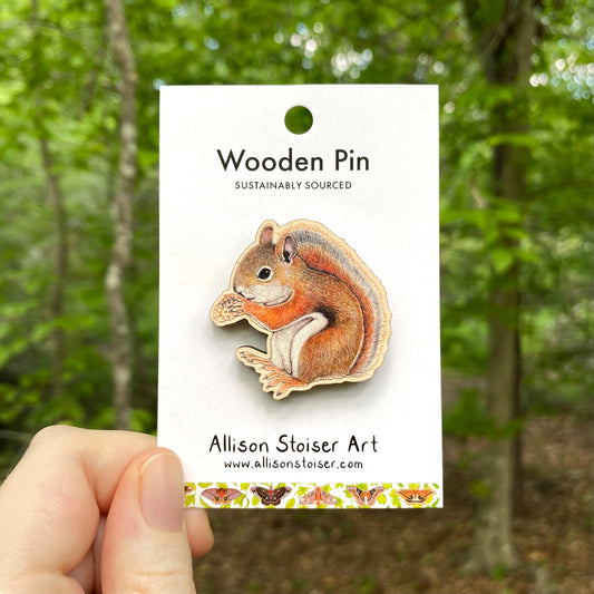 A wooden pin of an American red squirrel