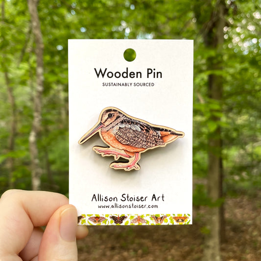 A wooden pin of an American woodcock