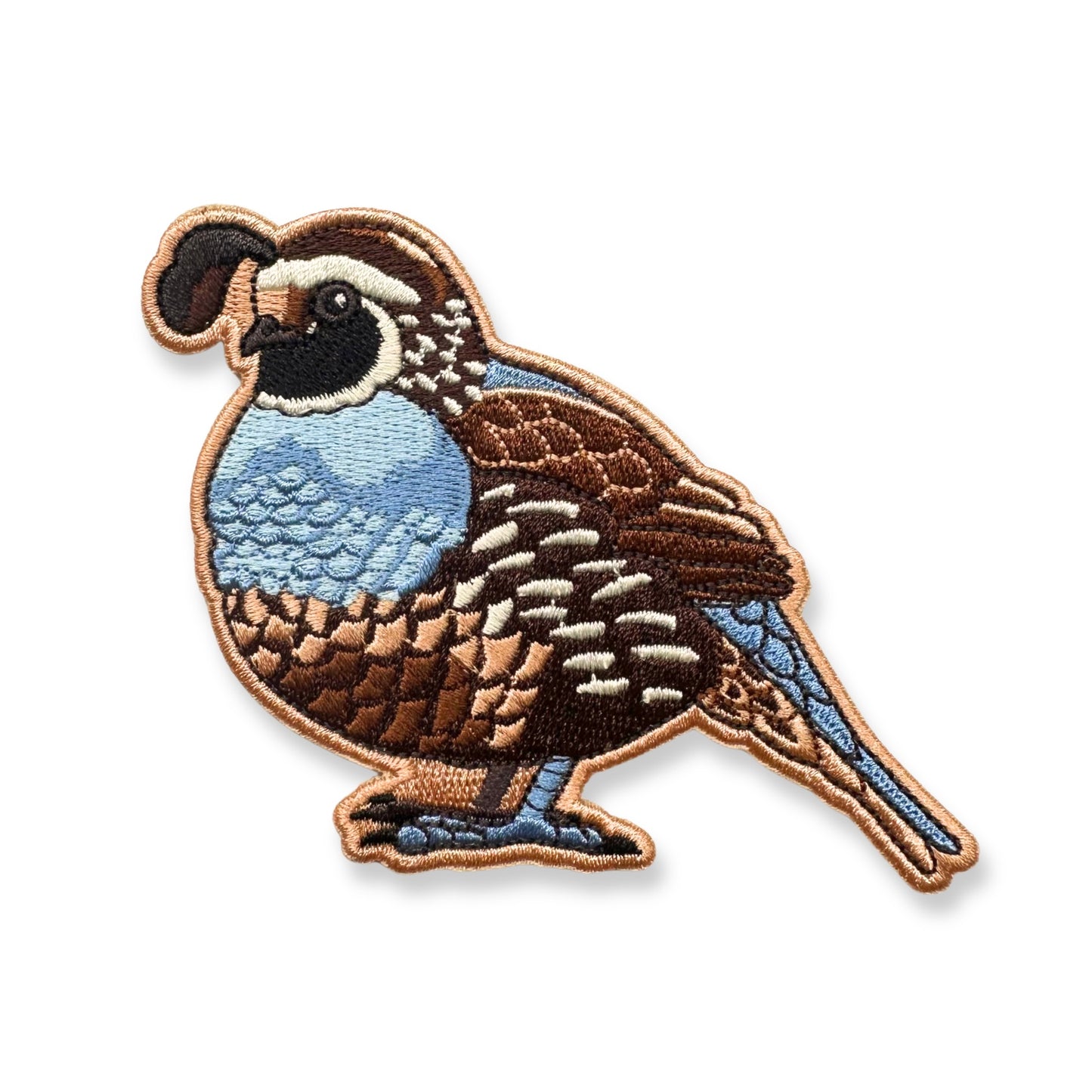 An embroidered patch of a California quail on a plain white background.