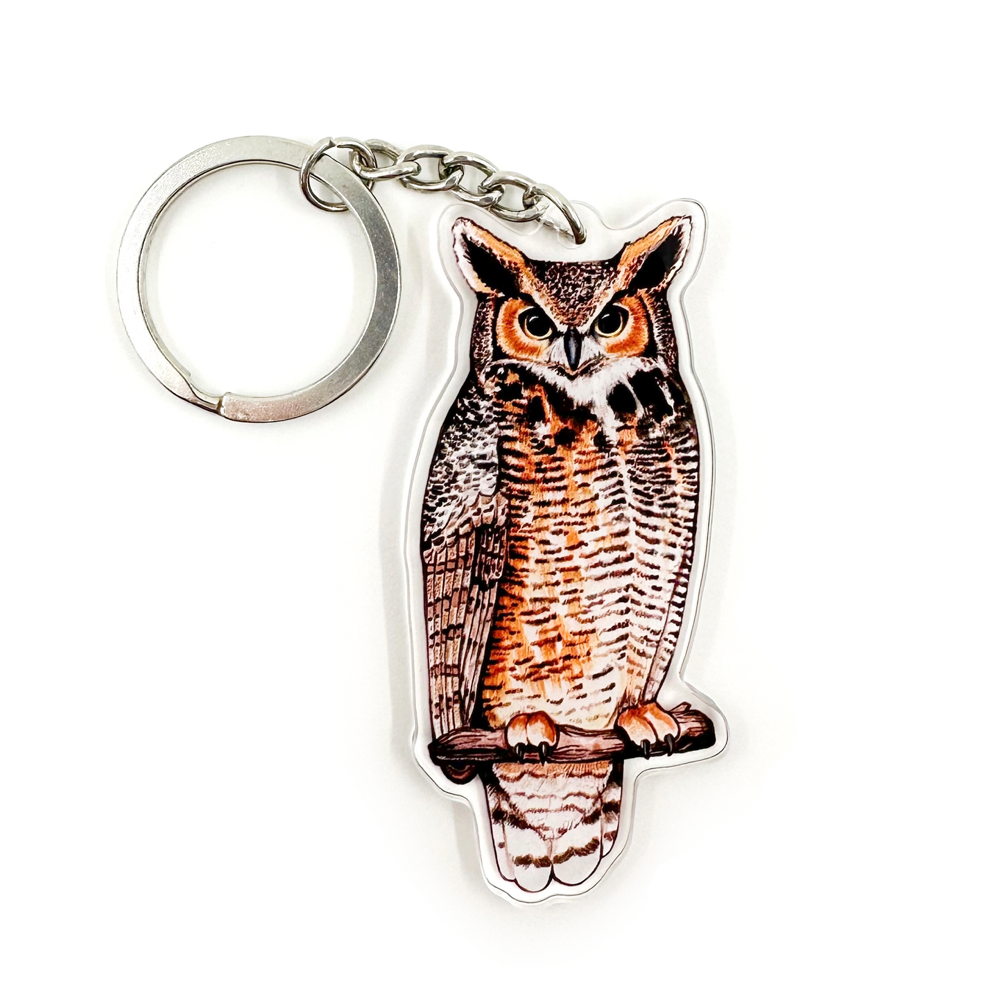 A keychain featuring a great horned owl