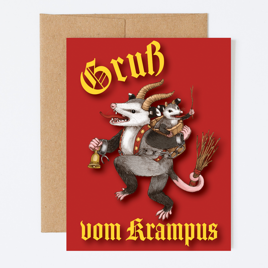 Greeting card featuring an illustration of an opossum dressed as Krampus with a raccoon, otter, and bear in the background, with 'Gruß vom Krampus' text, placed on a red background. The card is paired with a kraft envelope.