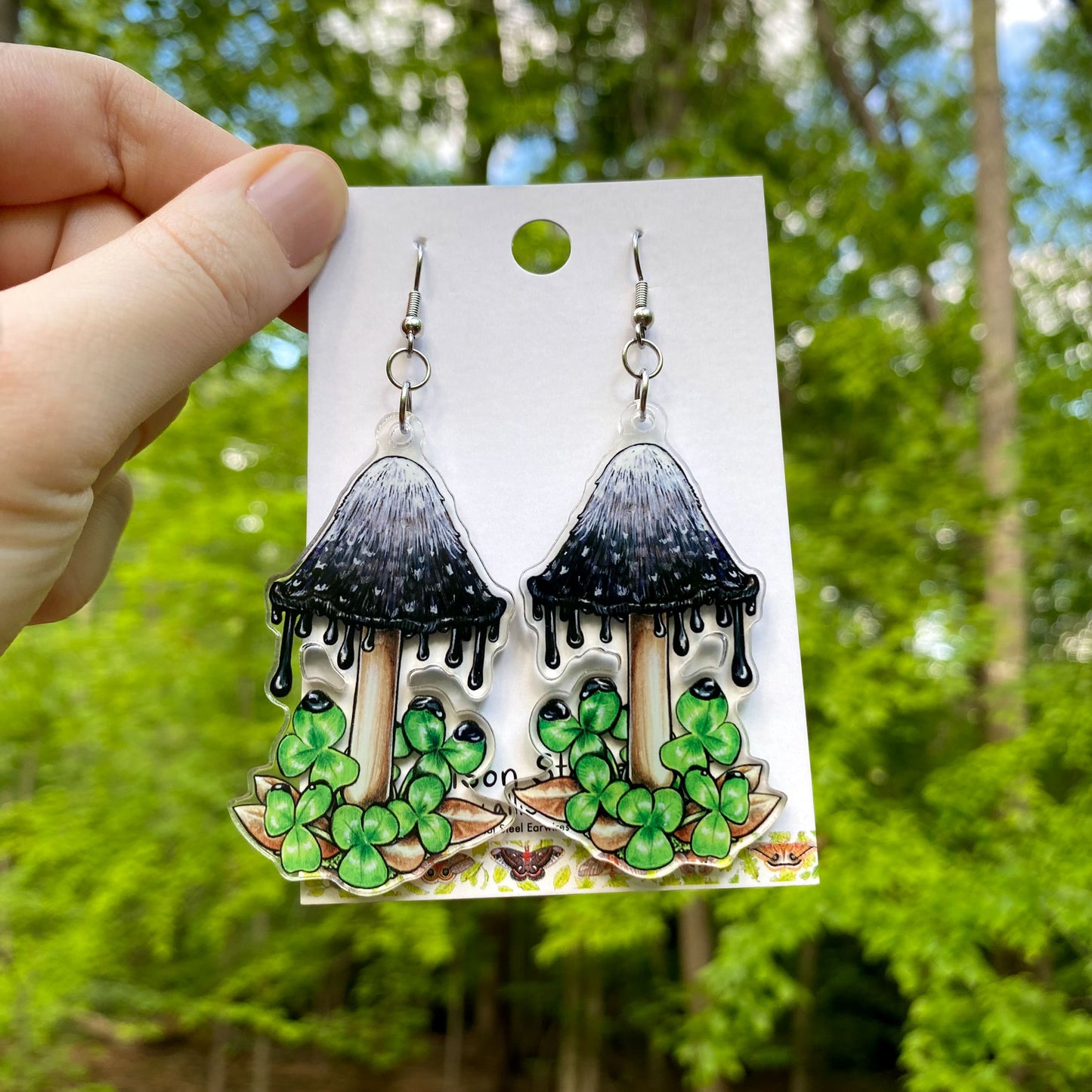 Acrylic earrings of inky cap mushrooms