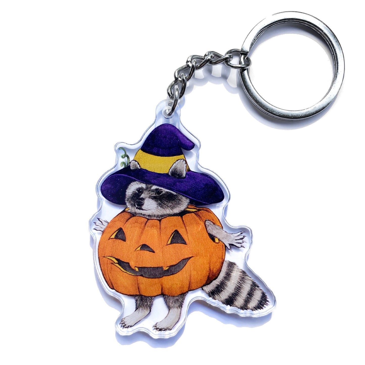 This double-sided acrylic keychain features my illustration of a raccoon in a witch hat dressed as a pumpkin. 