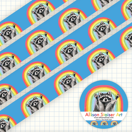 Pattern of raccoons with rainbow backgrounds on a blue background.