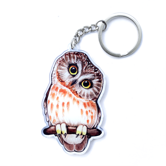 A keychain of a saw-whet owl