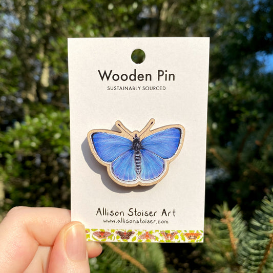 A wooden pin of a spring azure butterfly