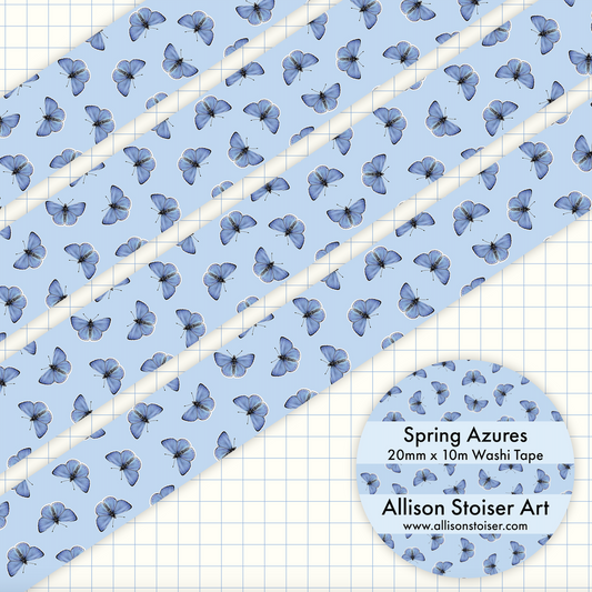 Spring azure butterfly patterned washi tape on a blue background.
