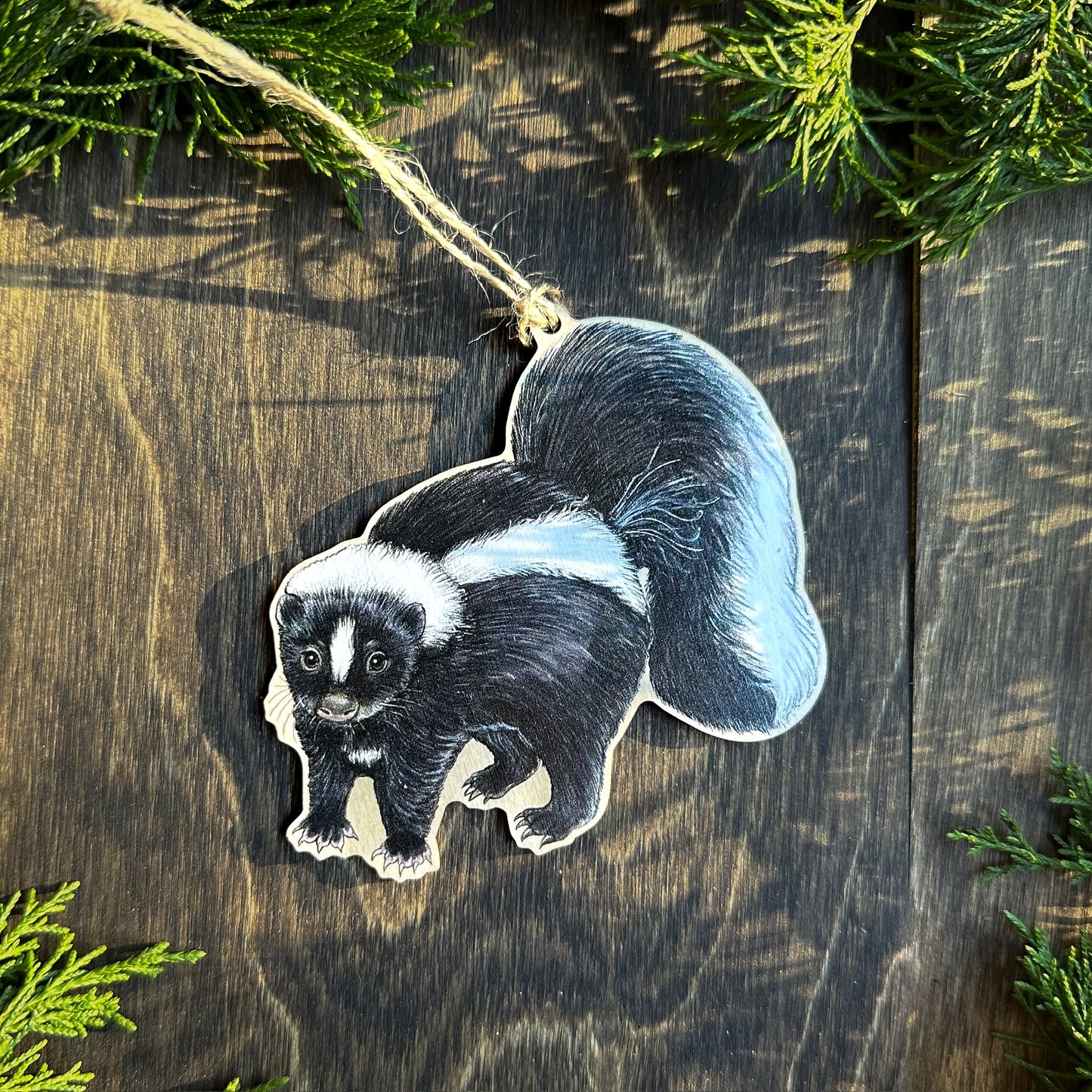 Striped skunk wood print ornament