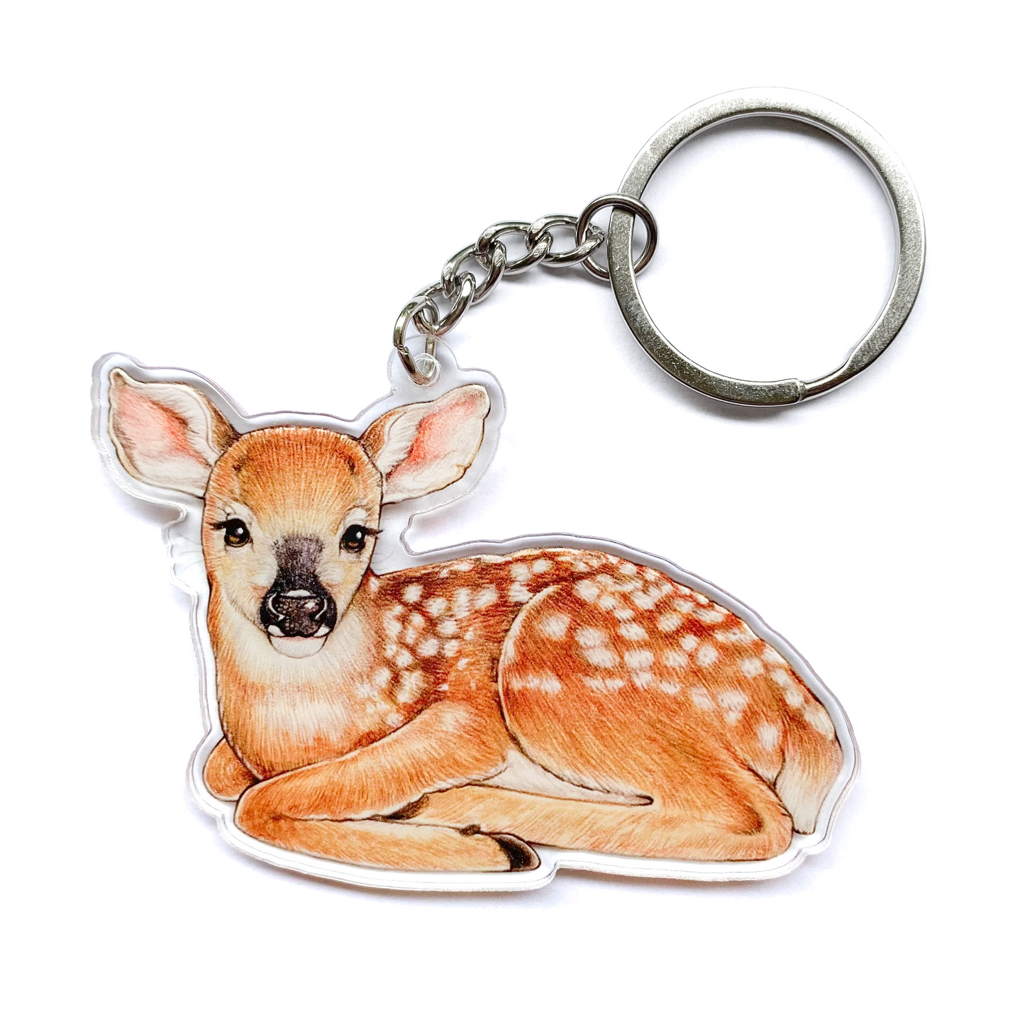Keychain of a deer fawn on a white background