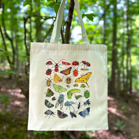 A totebag featuring an illustration of rainbow insects