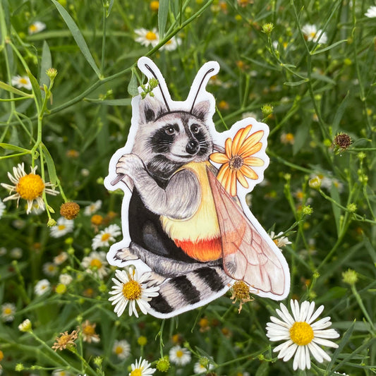 A weatherproof vinyl sticker featuring an illustration of a raccoon dressed as a bee