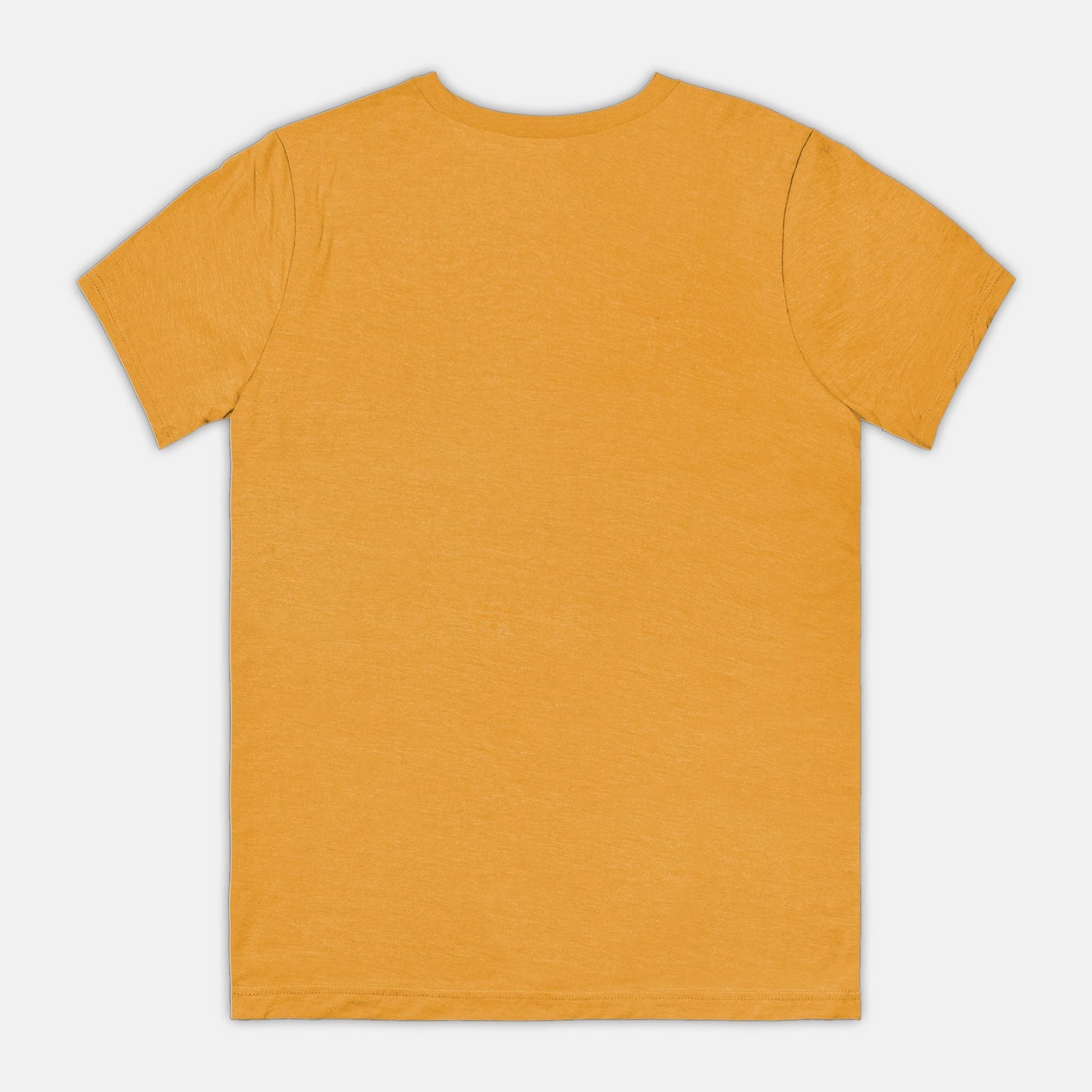 The blank back of a mustard-colored t-shirt