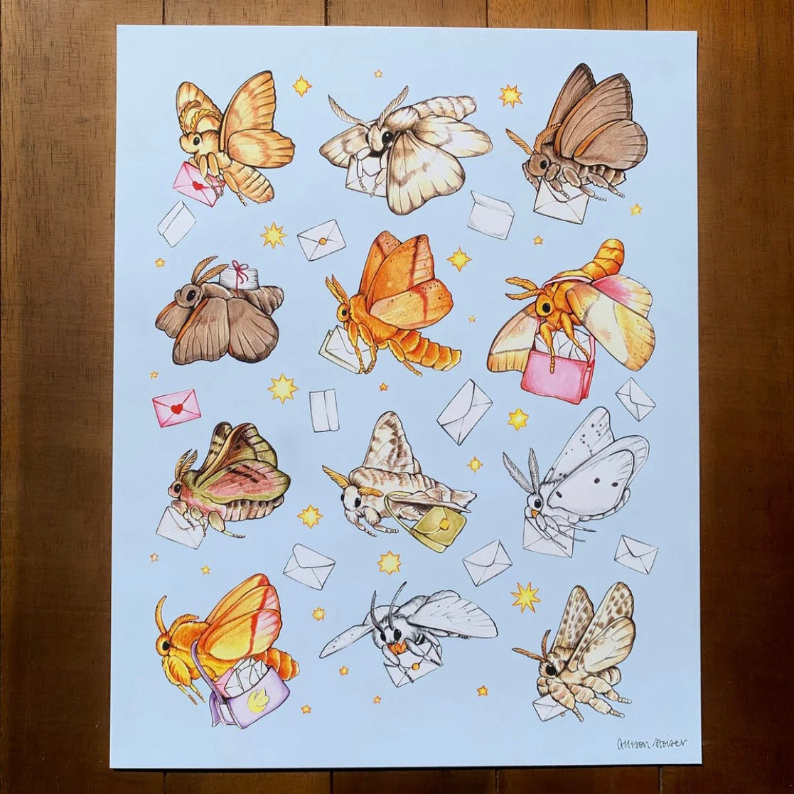 A print featuring moths delivering the mail