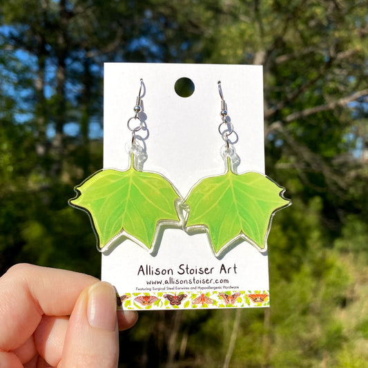 Acrylic earrings with charms of tuliptree leaves