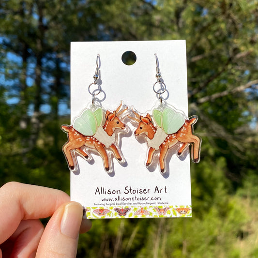 Earrings with acrylic charms of fawns with emerald moth wings 