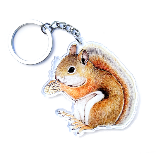 A keychain of a red squirrel