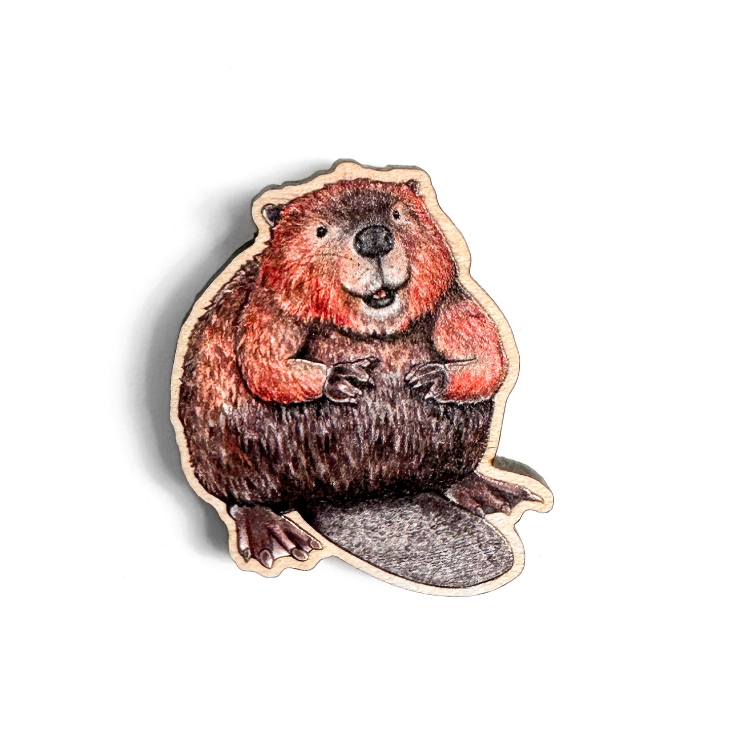 A wooden pin of an American beaver on a white background.