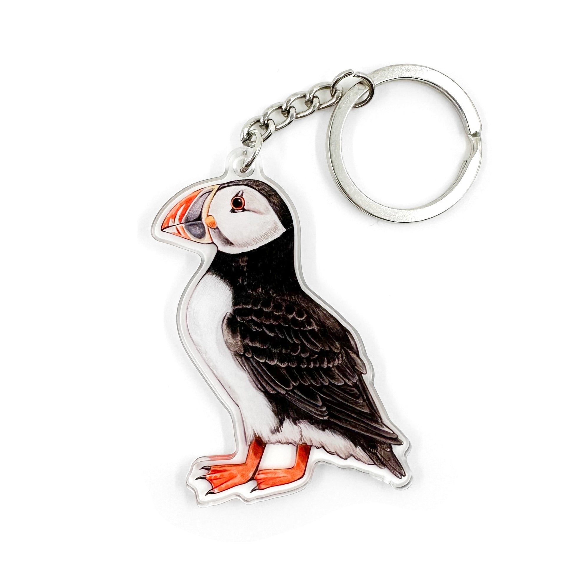 A keychain featuring an illustration of an Atlantic puffin