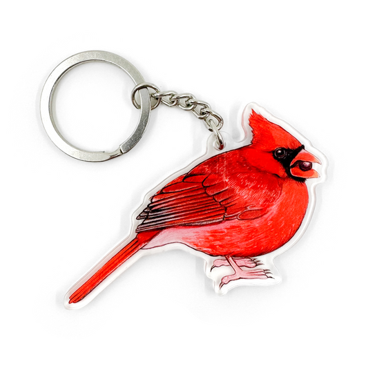 A keychain featuring a northern cardinal