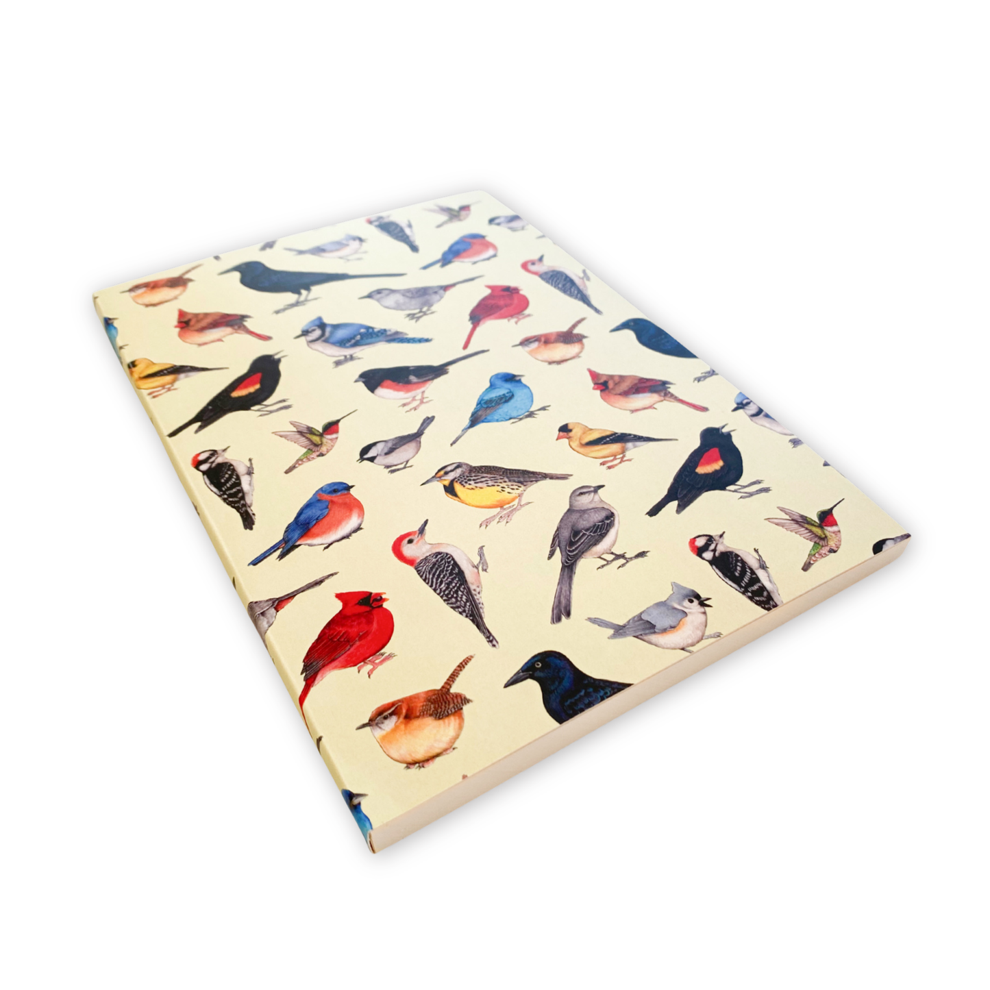 Notebook with bird illustrations on a beige background