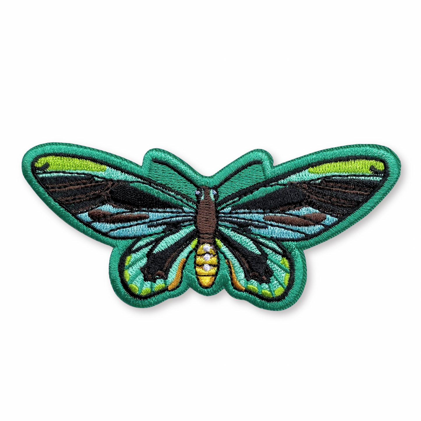 Patch of a birdwing butterfly on a white background