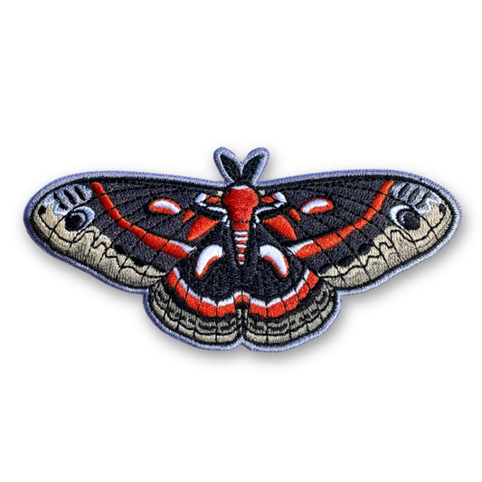 Cecropia moth patch on a white background