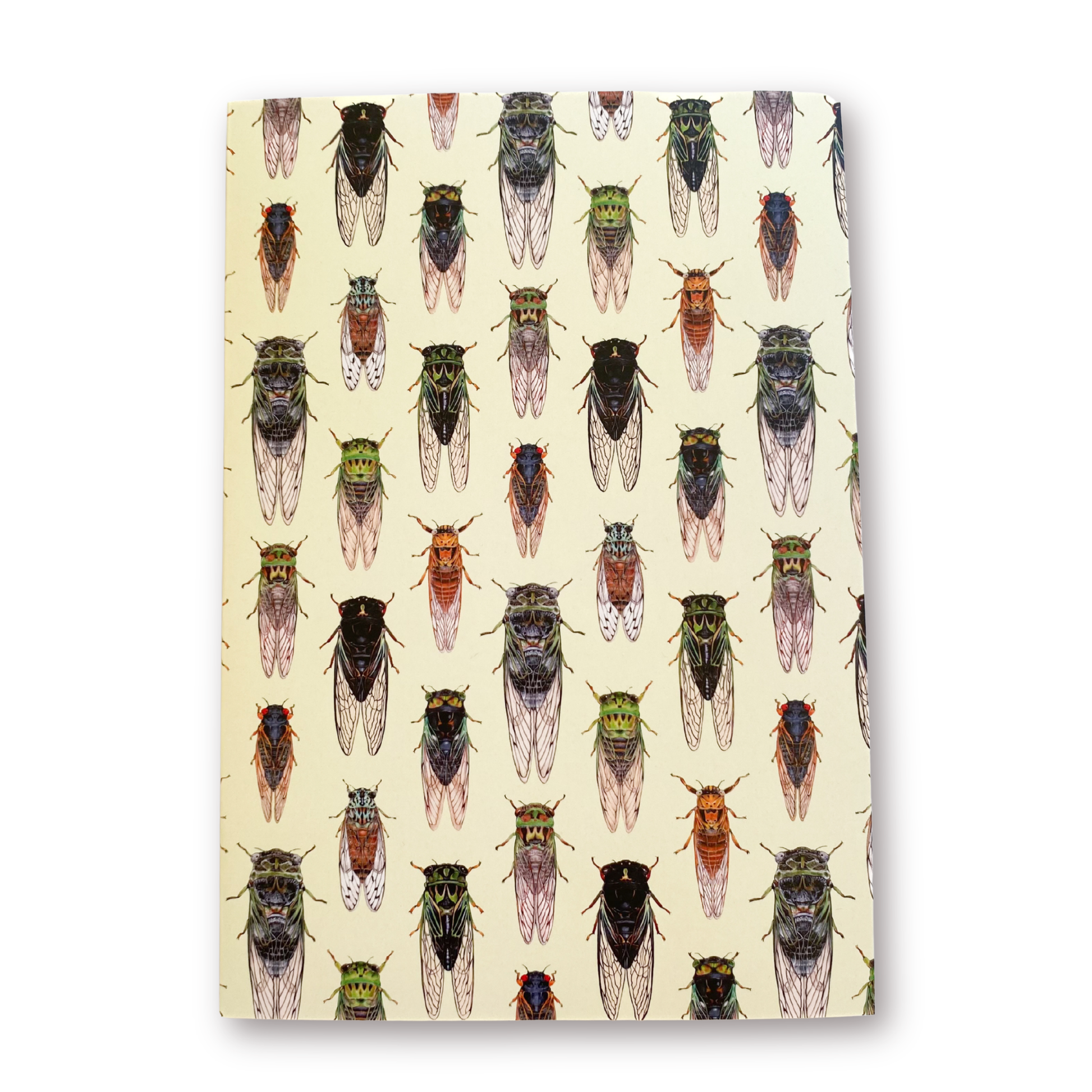 Notebook with cicada pattern on a beige background