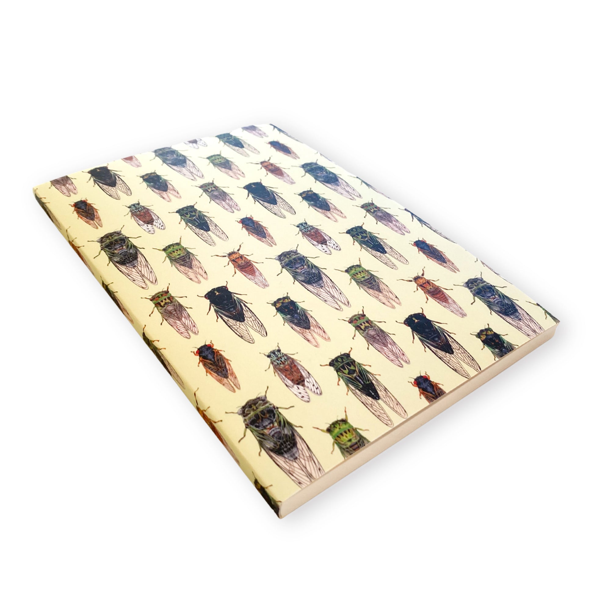 Notebook with cicada pattern on a white background
