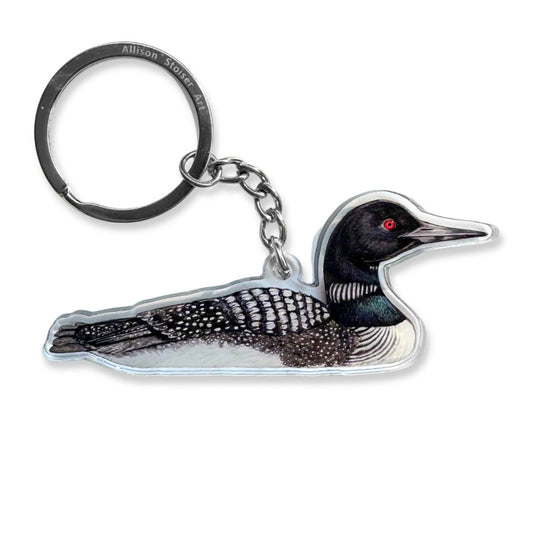 An acrylic keychain of a loon.