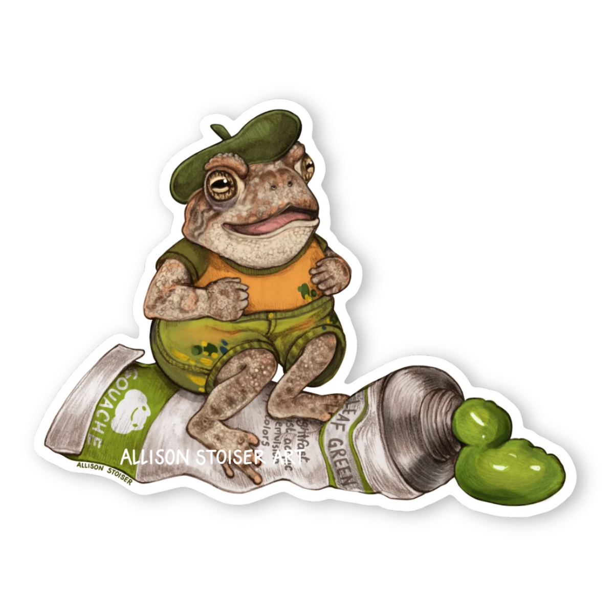 A sticker of a toad hopping on top of a tube of green gouache. He is wearing a beret, green shorts, and a paint-splattered yellow and green shirt.