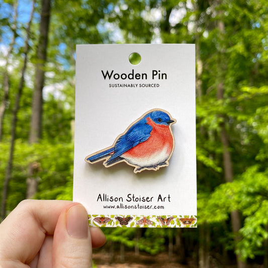 Wooden pin of a male eastern bluebird