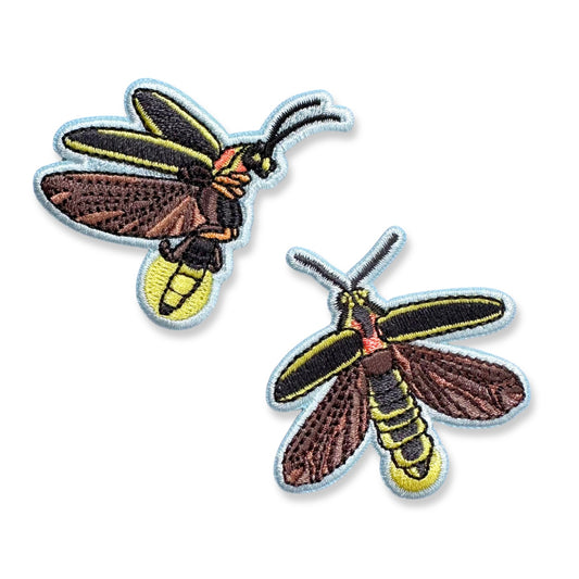 Two embroidered firefly patches, shown on a plain white background.