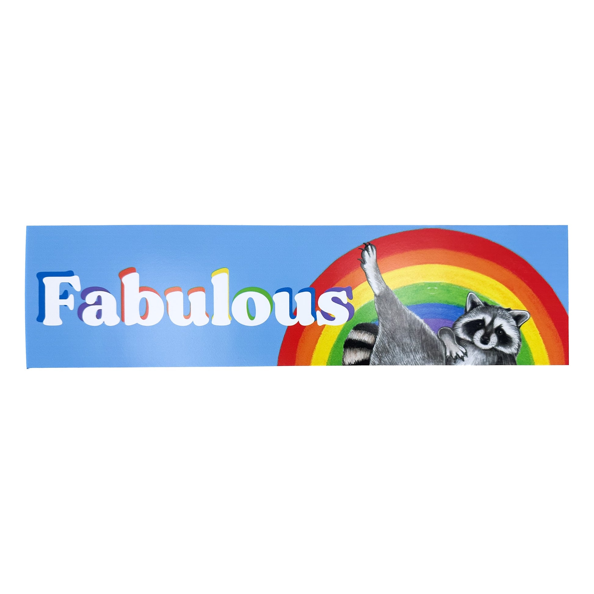 A bumper sticker of a raccoon lounging in front of a rainbow on a blue background. The sticker reads "Fabulous" in bubbly text.