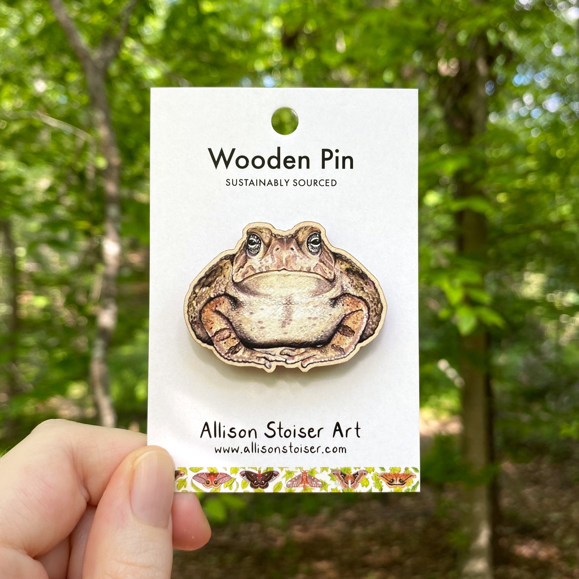 A wooden pin of a Fowler’s toad
