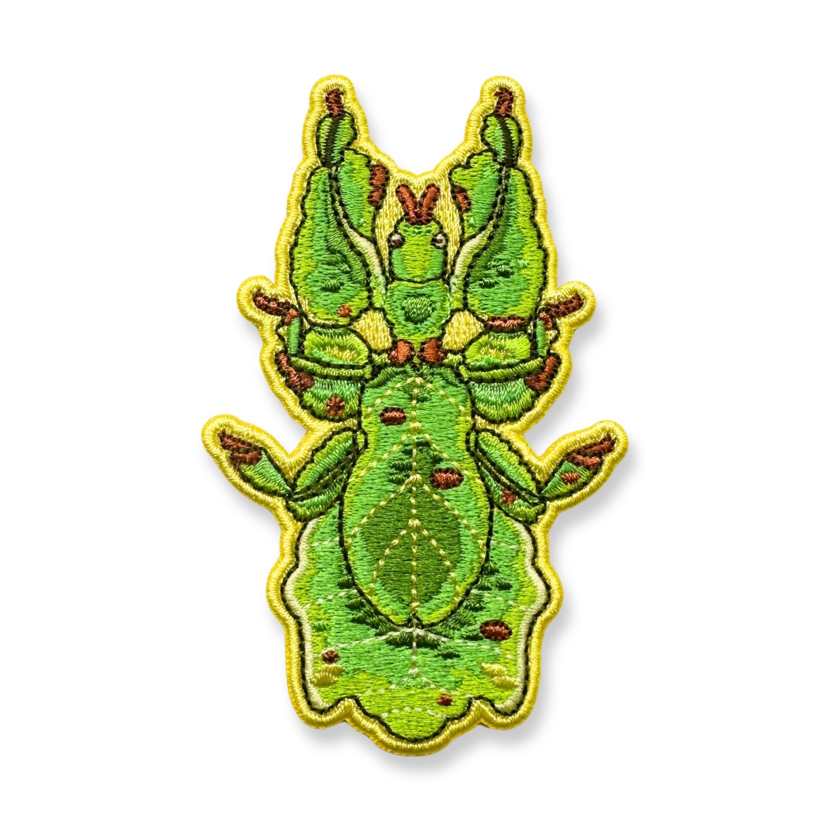 An embroidered patch of a Malaysian leaf insect shown on a plain white background.