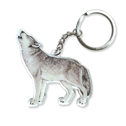 An acrylic keychain of a gray wolf.