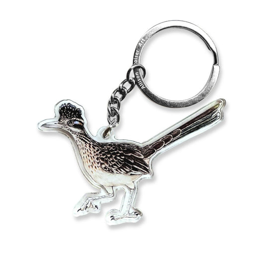 An acrylic keychain of a greater roadrunner.