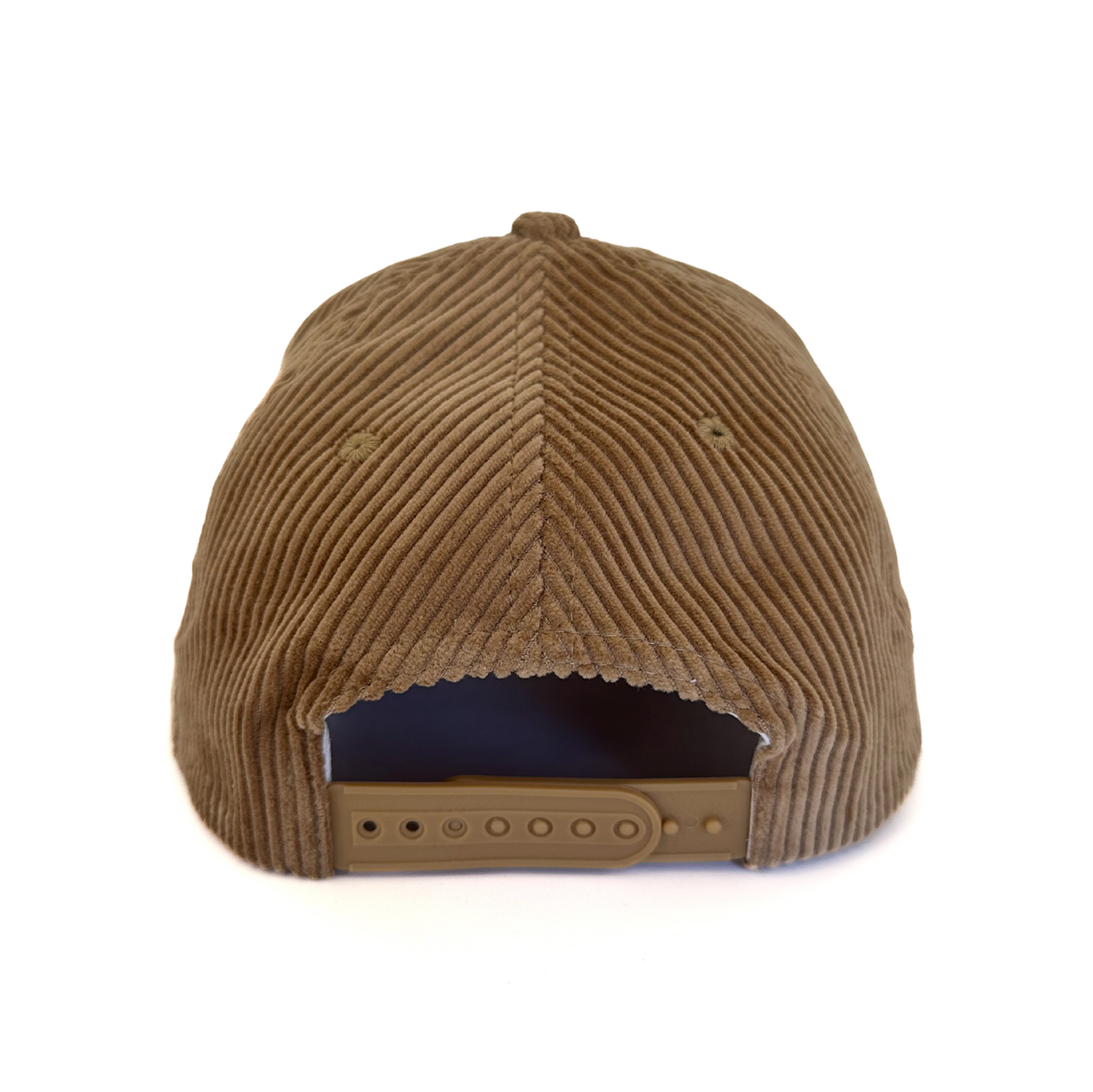 Brown corduroy cap on a white background