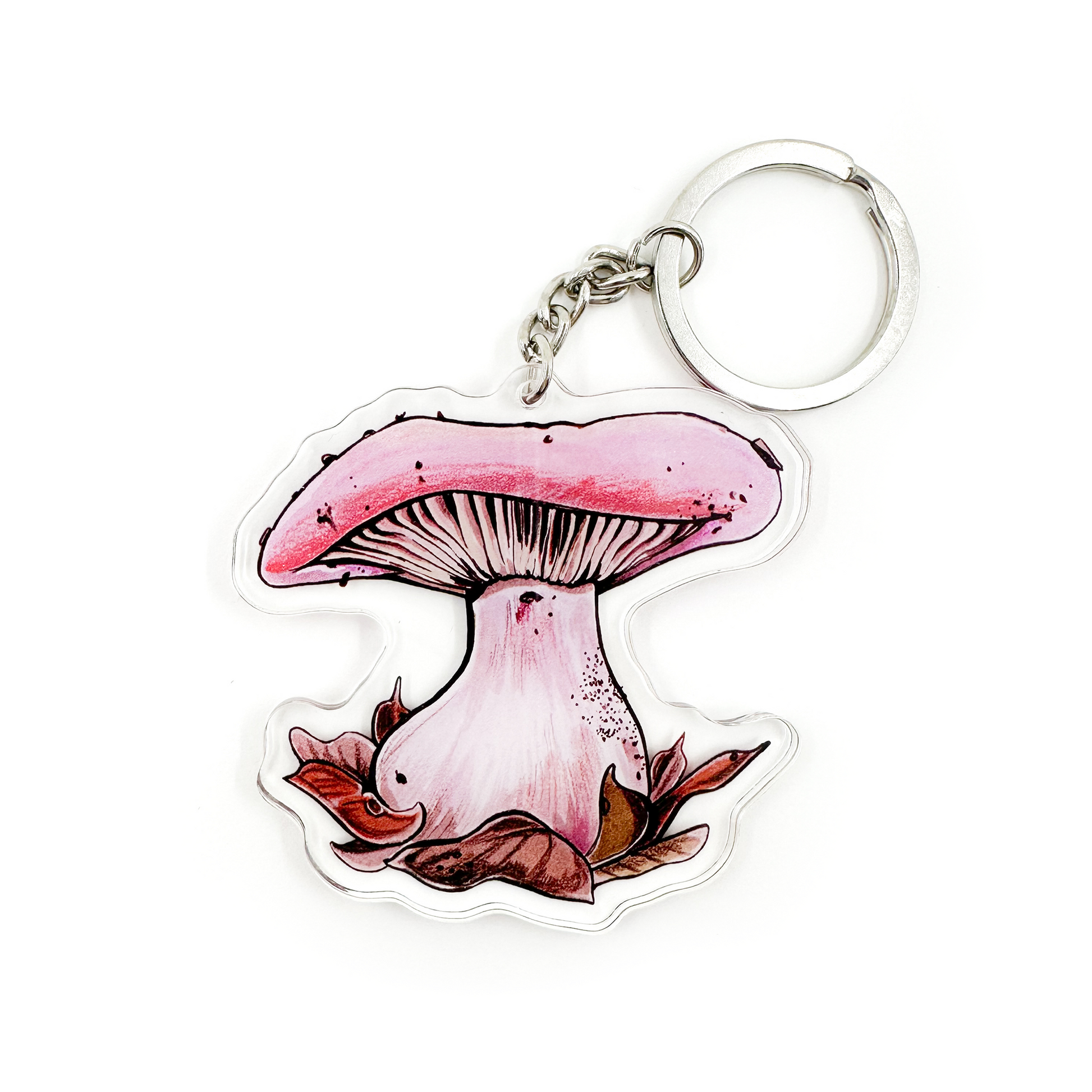 A keychain featuring a wood blewit mushroom