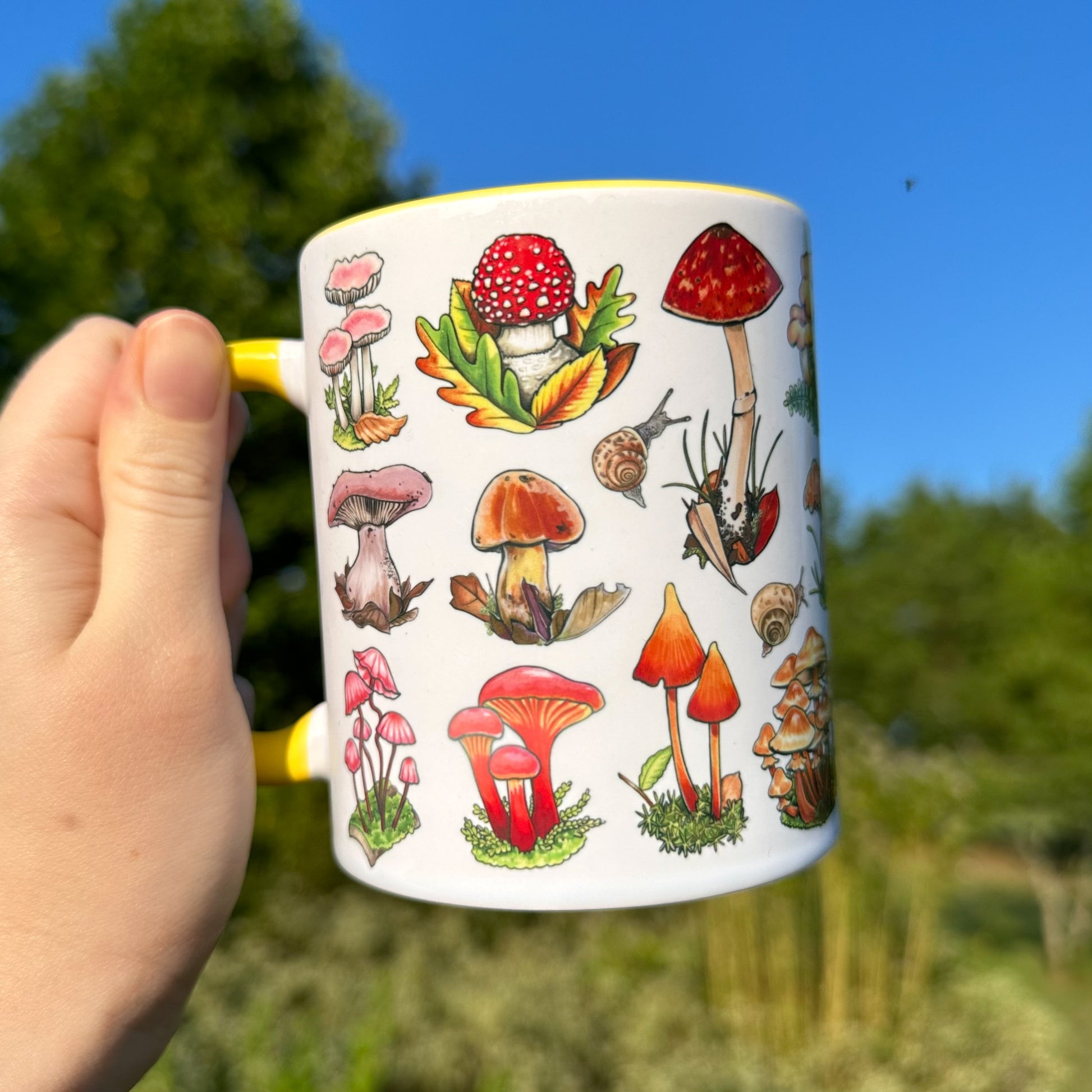 A mug featuring illustrations of colorful insects