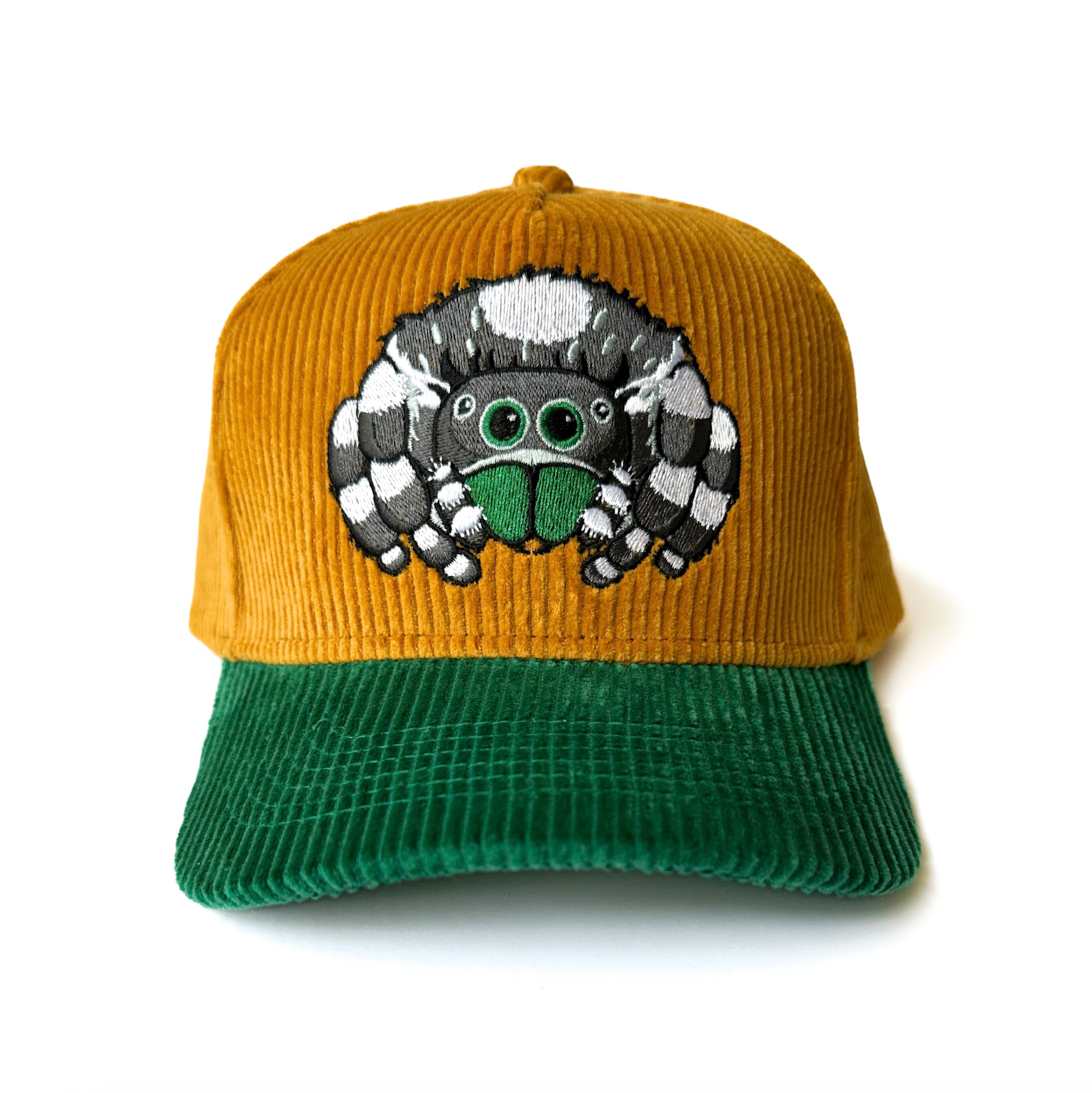 Yellow and green cap with an embroidered jumping spider on a white background