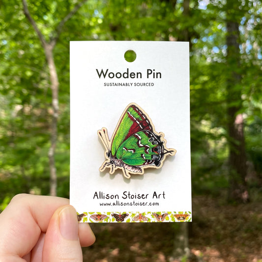 A wooden pin of a juniper hairstreak
