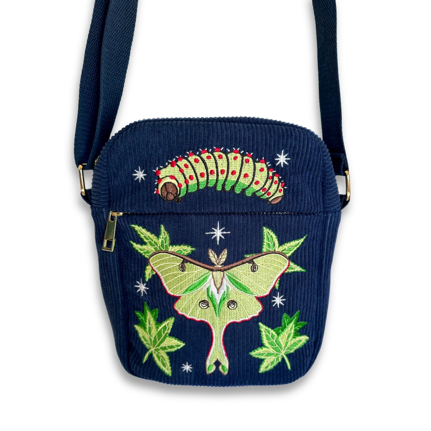 Navy blue crossbody bag with embroidered luna moth and caterpillar on a white background