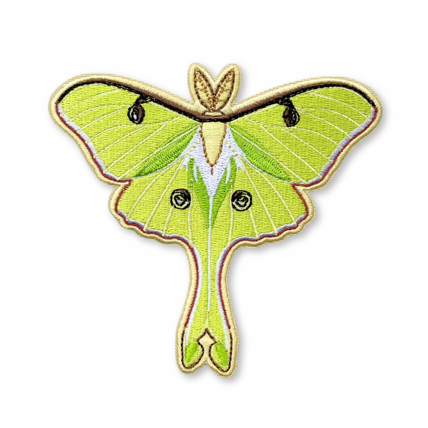 Embroidered patch of a luna moth on a white background