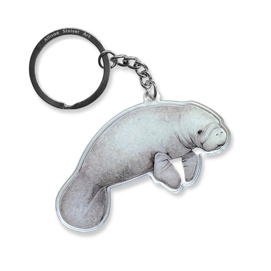 An acrylic keychain of a manatee.