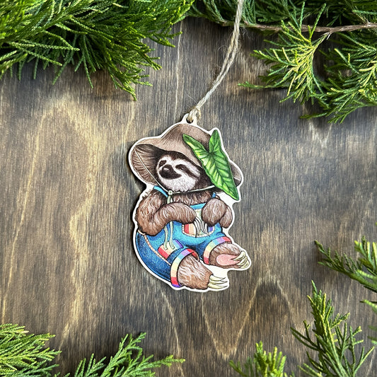 An ornament of a sloth in a mushroom hat