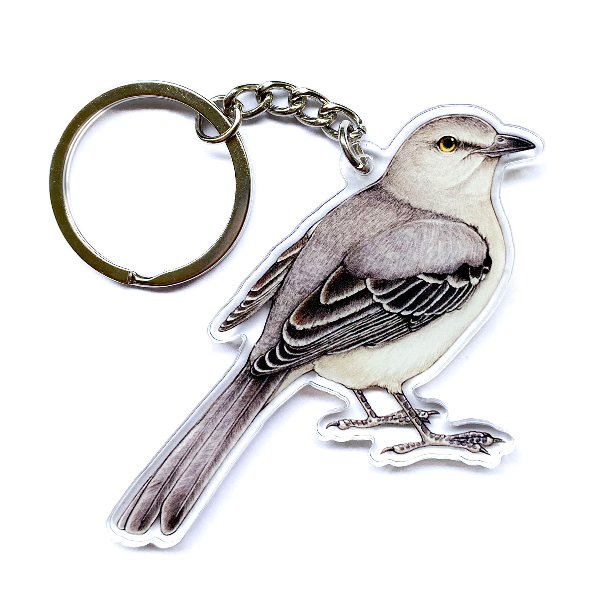 Northern mockingbird keychain on a white background
