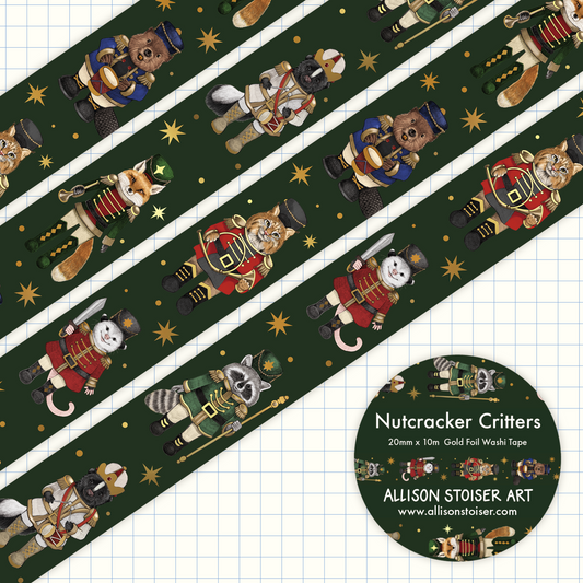 Gold foil washi tape with animal nutcrackers and stars on a dark green background.